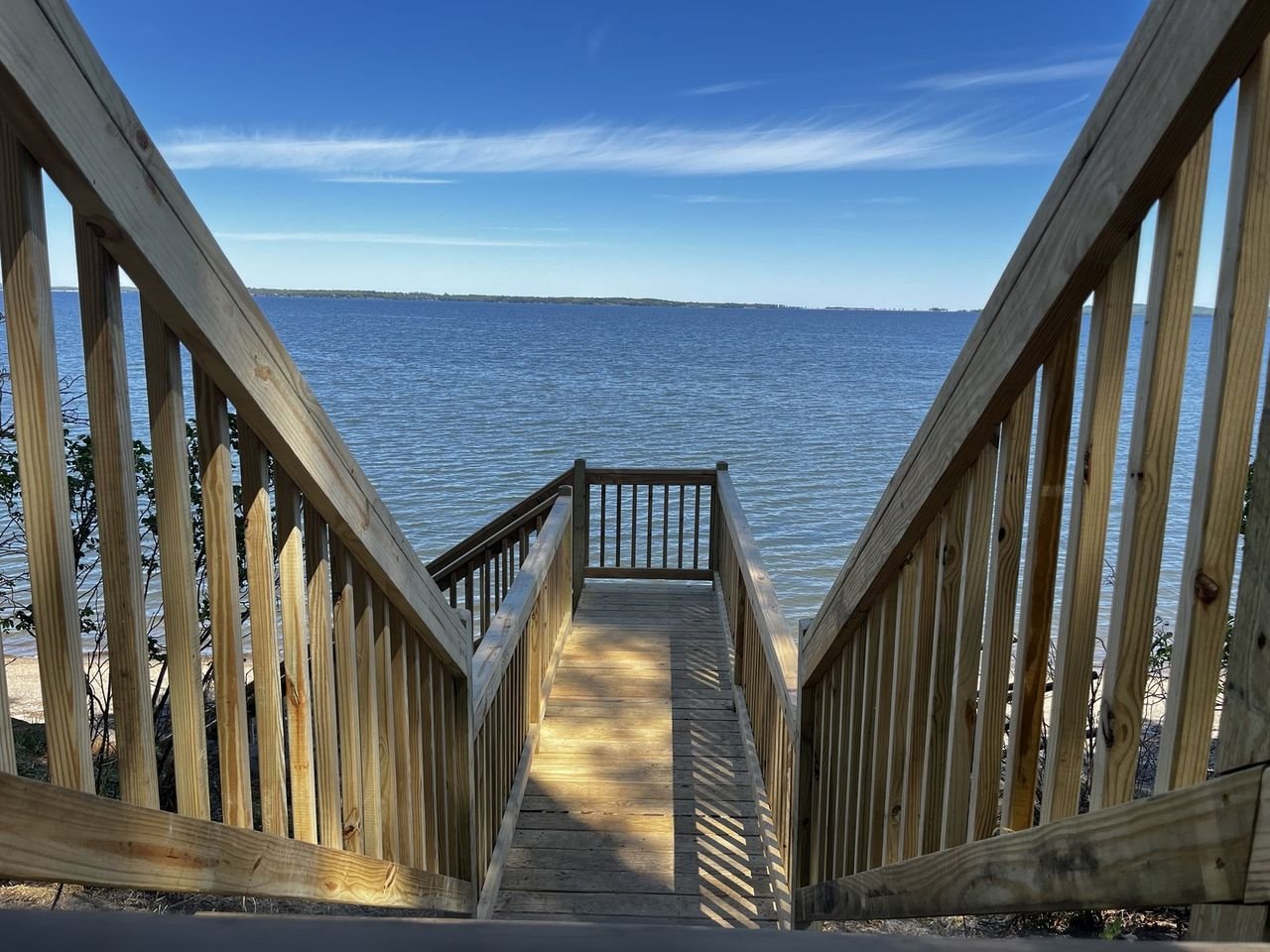 Pressure-treated stair run with railings on both sides